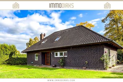 Bingum: 
Attraktiver Bungalow mit 2 Kaminen, Sonnenterrasse & großem Garten