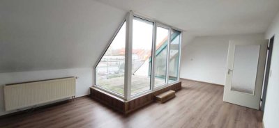 Sonnige Aussichten: Gemütliche 2-Zimmer-Wohnung mit Balkon und Dachterrasse