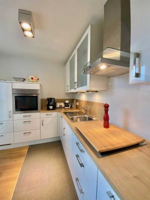 Moderne 3 - Raum Wohnung mit Südterrasse in hochwertiger Ausstattung Nähe Nordbadestrand.