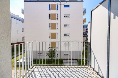 Ihre Wohlfühloase: Helle 2-Zi.-Wohnung mit Balkon, Markenküche und Tiefgaragenstellplatz