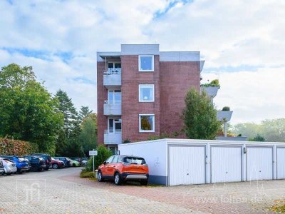 Schön gepflegte Terrassenwohnung mit moderner Einbauküche und Garage