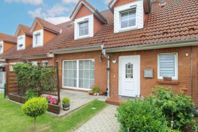 Einziehen und Wohlfühlen: Gepflegtes Reihenmittelhaus mit Carport und pflegeleichtem Garten