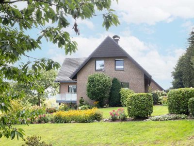Großzügiges Einfamilienhaus trifft auf ruhige Waldrandlage in Hilter