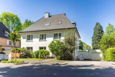 Ein Dreifamilienhaus mit großem Garten - mitten in der Stadt
