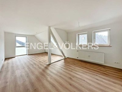 Erstbezug nach Renovierung: Moderne Dachgeschosswohnung in zentraler Lage