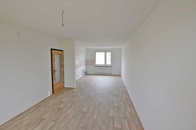 2-Raum-Wohnung mit offener großer Wohnküche, Ankleide und begehbarer Dusche! Bezug sofort möglich!