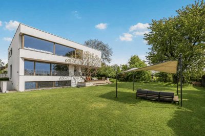 Wohnen auf höchstem Niveau – Exklusive & Energieeffiziente Villa in idyllischer Feldrandlage!