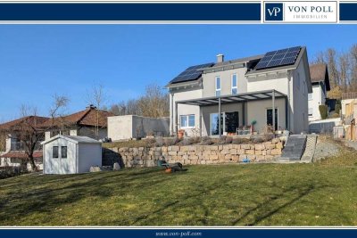 Neuwertiges A+-Haus: Exklusive EBK, PV-Anlage, Kamin, Smart Home, Garage & Stellplätze!