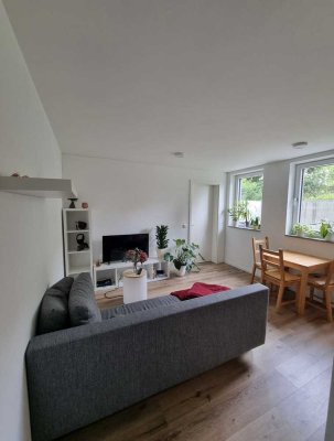 Moderne 2-Zimmer-Gartenidylle: Zentral & ruhig im Souterrain