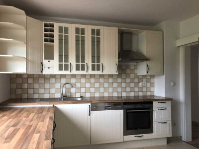 EG-Wohnung mit abgetrenntem 250 qm Gartenanteil und Balkon- ideal für kleine Familie