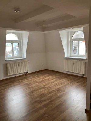 Zentrumsnahes Wohnen mit toller Aussicht & Flair im DG!