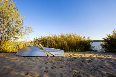 Wohnen, wo andere Urlaub machen - direkter Seezugang! |Kamin mit romantischem Sonnenuntergang