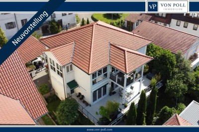 Mediterrane Villa nah am See: mit Seesicht, nachhaltiger Energietechnik und drei Wohneinheiten