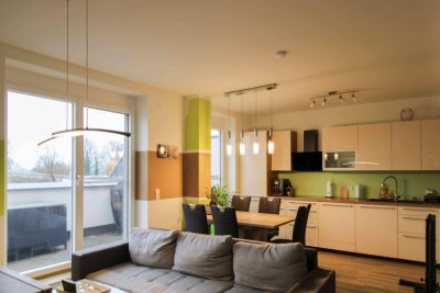 Freundliche, energieeffiziente 2-Zimmer-Wohnung mit großer Terrasse in Ruhelage