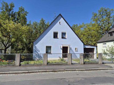 Wohnen am Wiesengrund – gepflegtes Familienhaus mit Wintergarten und Gartenidylle