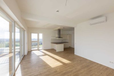 Helle Maisonette‑Wohnung mit großem Balkon und schönem Ausblick