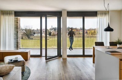 Neubau: Moderne 4-Zimmerwohnung mit West-Loggia und weitem Blick in die Natur
