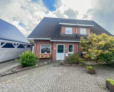 Kapitalanlage: Vermietete Doppelhaushälfte mit Garten in guter Lage
