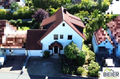 Charmantes Ein- bis Zweifamilienhaus mit 172 m² Wohnfläche und sonnigem Garten