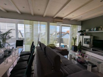 Stilvolle Wohnung mit großen bodentiefen Glasflächen