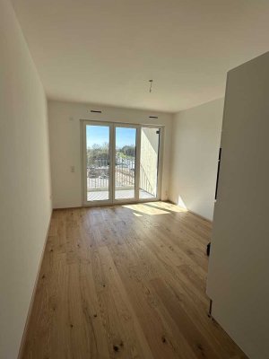Neue 1-Zimmer-Wohnung in Ecklage mit Balkon und EBK im VIVO
