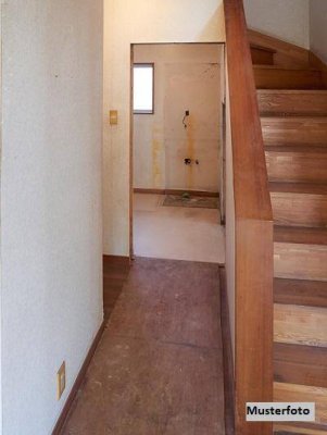 Maisonette-Wohnung mit Terrassen und Garten