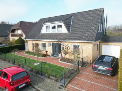 Hinte! Ausgebauter Bungalow mit Garage in ruhiger Siedlungslage zu verkaufen!