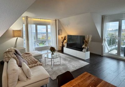 Besondere Wohnung mit wunderbarem Blick und Südbalkon
