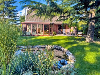 Licht. Ruhe. Lebensqualität – Einfamilienhaus mit traumhaftem Süd-Grundstück und Baureserve auf s...