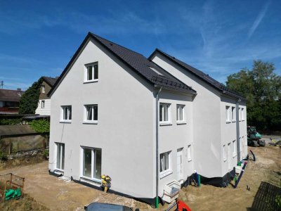 Luxuriöser Erstbezug: Reihenendhaus mit großem Garten, Carport & Homeoffice – Energieklasse A+