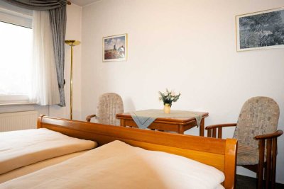 Top-Investment: Café, Apartments & TG-Stellplatz - Teil- oder Gesamtkauf möglich!
