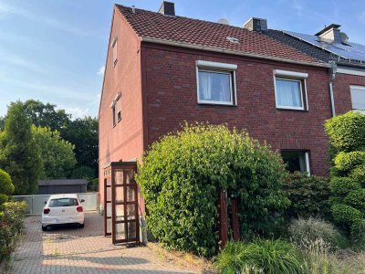 Doppelhaushälfte mit großem Garten und viel Potenzial in familienfreundlicher Wohnlage!