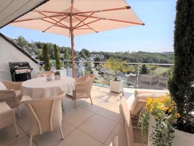 Traumhafte Maisonette-Eigentumswohnung mit Dachterrasse & großzügigem Garten