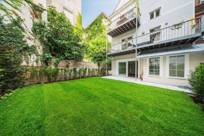 URBANER GARTENTRAUM nächst Schlossquadrat! Hofseitiger Drei-Zimmer-Erstbezug mit Terrasse und Eigengarten