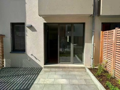 NEUBAU! Schöne 3-Zimmer-Wohnung mit Gartenanteil, Terrasse und Einbauküche