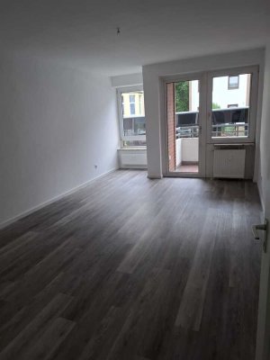 Helle Erdgeschosswohnung mit Balkon in Neumünster