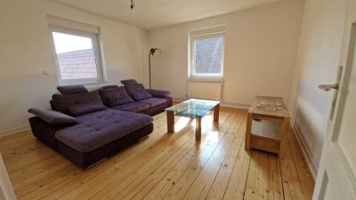 Helle und stilgerecht renovierte 3-Zimmer-Wohnung im Zweifamilienhaus mit Garten und Hofanlage