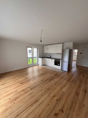 Erstbezug! Helle 2-Zimmer Wohnung mit Balkon und Garten