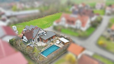 Attraktives Einfamilienhaus mit schönem Garten und Pool