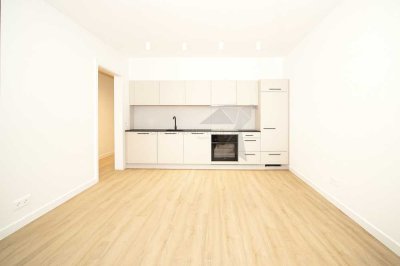 ++ Erstbezug ++ barrierefreie 4-Zimmer-Wohnung mit 2 Balkonen, Einbauküche & Tiefgaragenstellplatz