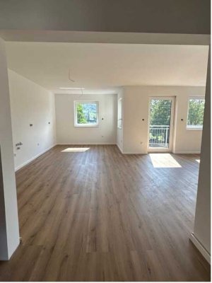 Lichtdurchflutete, energieeffiziente Neubauwohnung mit Rheinblick
