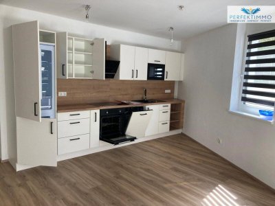 Moderne 3-Zimmer-Wohnung mit Terrasse und großem Garten