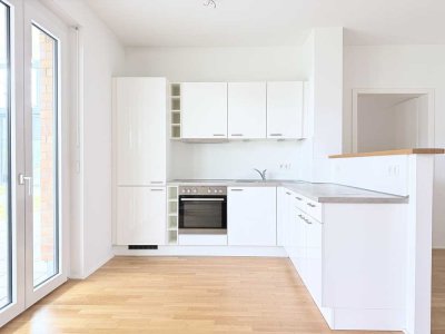Moderne Erdgesosswohnung mit offener Markenküche und großzügiger Terrasse