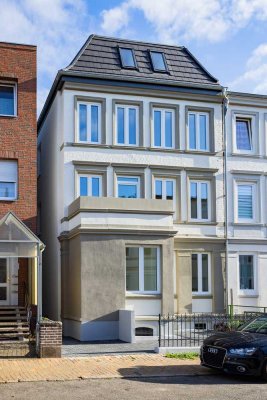 Ruhige 2-Zimmer-Altbauwohnung mit großer Terrasse & Gartenanteil