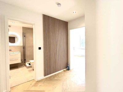 Erstbezug nach Sanierung! Hochwertige und teilmöblierte Wohnung in direkter Rheinnähe!