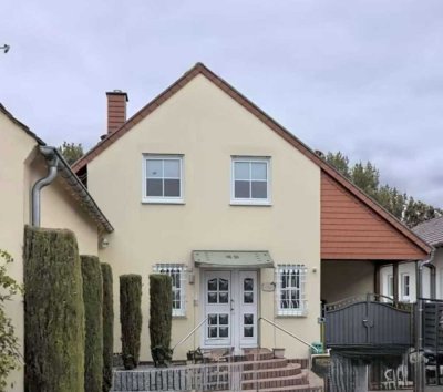 Einfamilienhaus mit wunderschönen Garten und Baupotenzial in Maxdorf – Wohnen, genießen & Investment