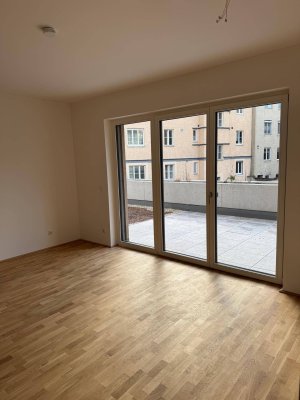 Erstbezug mit Dachgarten-Flair: Stilvolle 2-Zimmer-Neubauwohnung mit Terrasse &amp; TG mit Wallbox im Herzen der Kremser Altstadt – provisionsfrei!