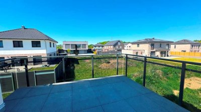 Neubau-Erstbezug: Stilvolle 3-Zimmer-Wohnung mit Balkon & Stellplatz