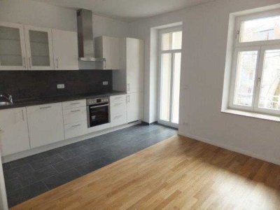 STILVOLLE 2-Z-Wohnung mit Balkon, EBK, Fußbodenheizung und Gartenanteil