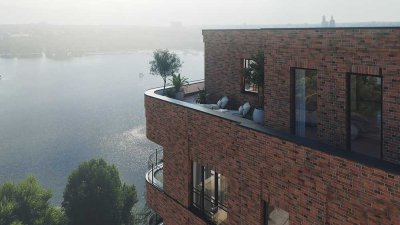 Insel-Penthouse mit Wasserblick: Einzigartiges Neubau-Penthouse mit Sonnenterrasse + Sauna + Kamin